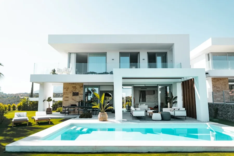 A pueblo-modern home with a shaded patio